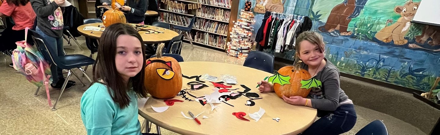 students and pumpkins