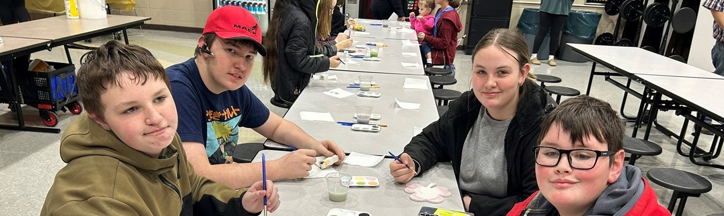 students doing work at a table